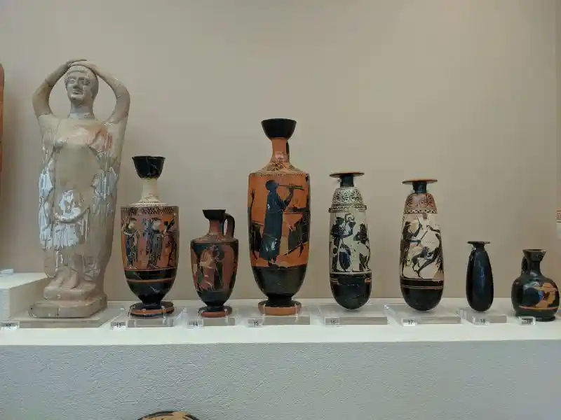 Ancient Greek pottery and mourning figure